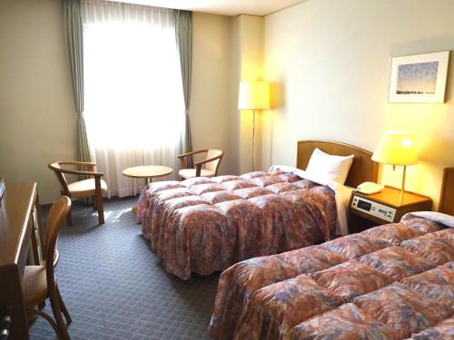 Imagen de la habitación del Hotel Shingu UI. Foto 6