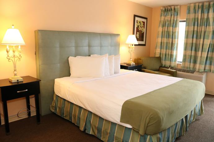Imagen de la habitación del Hotel Shining Light Inn & Suites. Foto 5