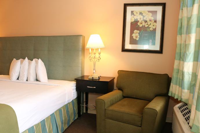 Imagen de la habitación del Hotel Shining Light Inn & Suites. Foto 6