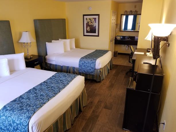 Imagen de la habitación del Hotel Shining Light Inn & Suites. Foto 13