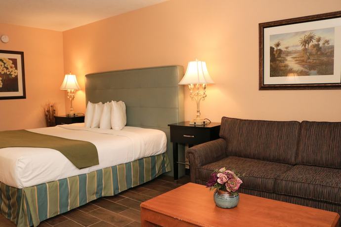 Imagen de la habitación del Hotel Shining Light Inn & Suites. Foto 14