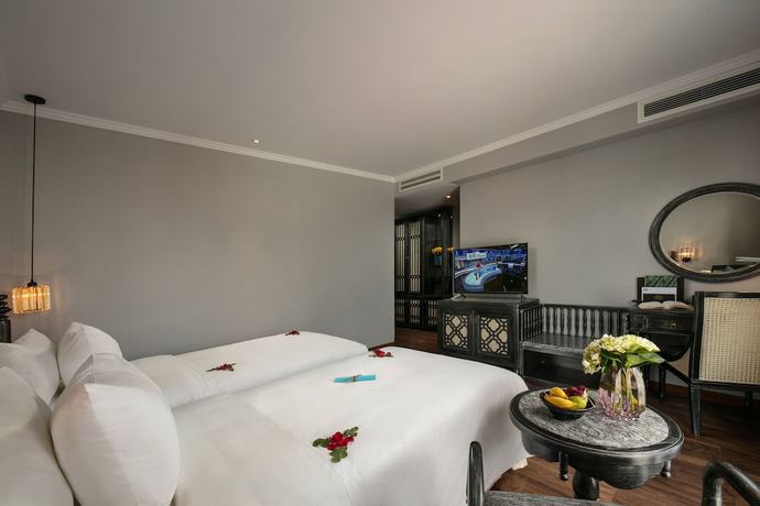 Imagen de la habitación del Hotel Shining Riverside Hoi An Boutique and Spa. Foto 9