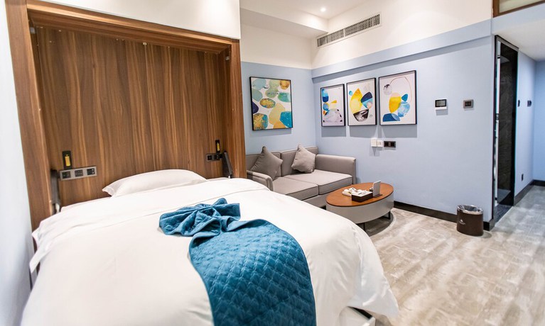 Imagen de la habitación del Hotel Shining Star Health Apartment. Foto 2