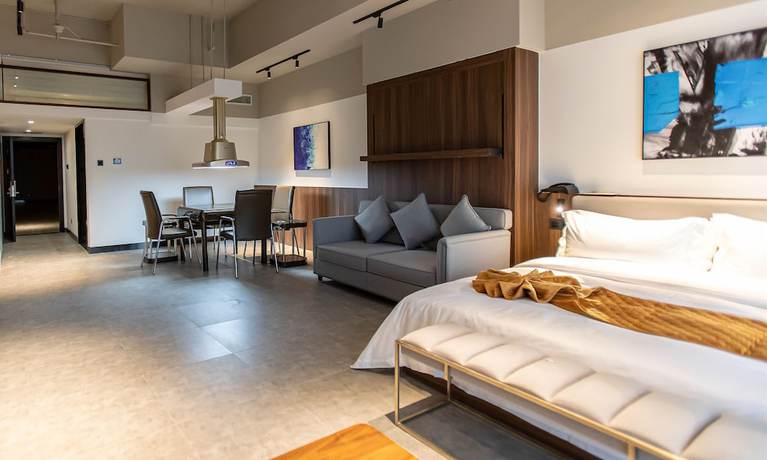 Imagen de la habitación del Hotel Shining Star Health Apartment. Foto 8