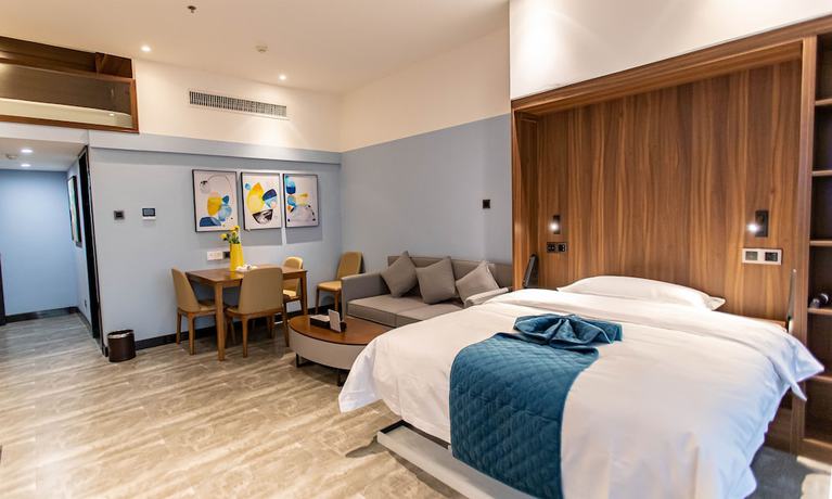 Imagen de la habitación del Hotel Shining Star Health Apartment. Foto 10