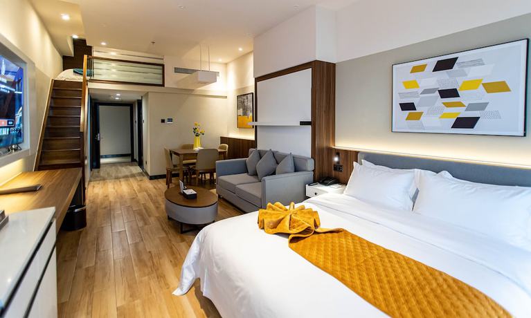 Imagen de la habitación del Hotel Shining Star Health Apartment. Foto 11