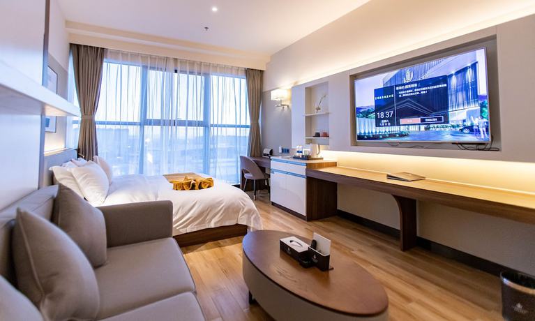 Imagen de la habitación del Hotel Shining Star Health Apartment. Foto 12