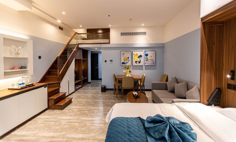 Imagen de la habitación del Hotel Shining Star Health Apartment. Foto 15