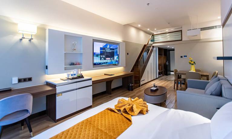 Imagen de la habitación del Hotel Shining Star Health Apartment. Foto 17