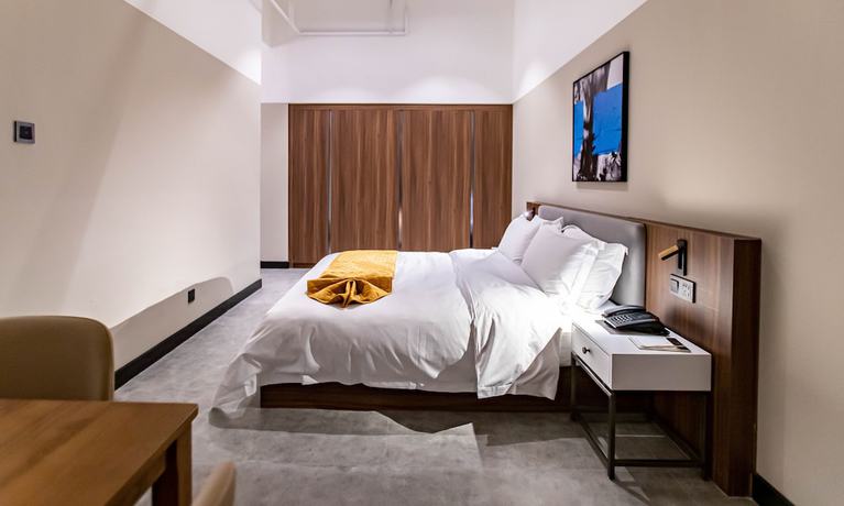 Imagen de la habitación del Hotel Shining Star Health Apartment. Foto 18