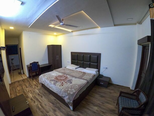 Imagen de la habitación del Hotel Shining Star Resort. Foto 17