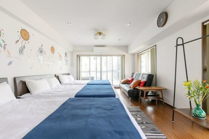 Imagen de la habitación del Hotel Shinjuku Hana Luxury House. Foto 23