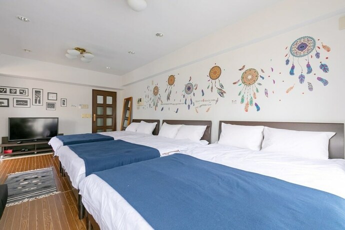 Imagen de la habitación del Hotel Shinjuku Hana Luxury House. Foto 25