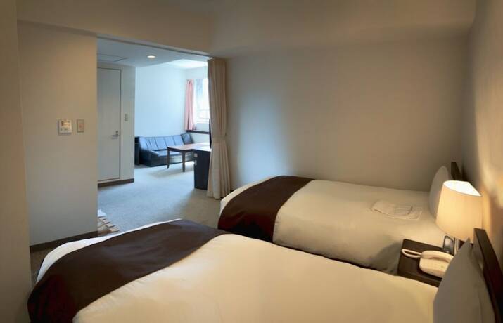 Imagen de la habitación del Hotel Shinjuku Sun Park. Foto 13