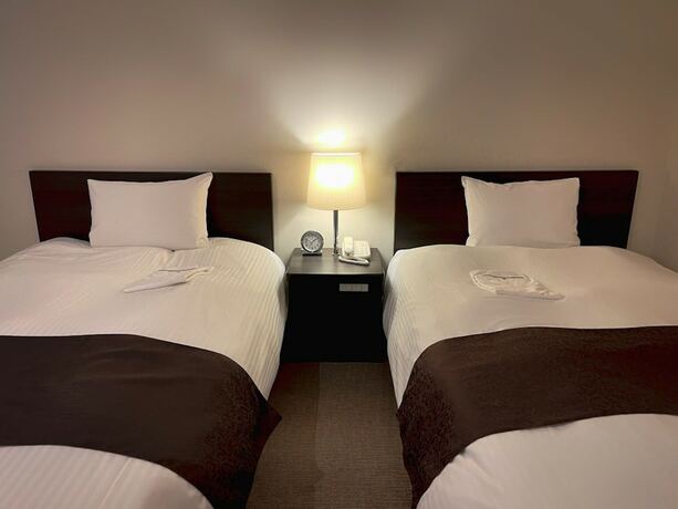 Imagen de la habitación del Hotel Shinjuku Sun Park. Foto 15