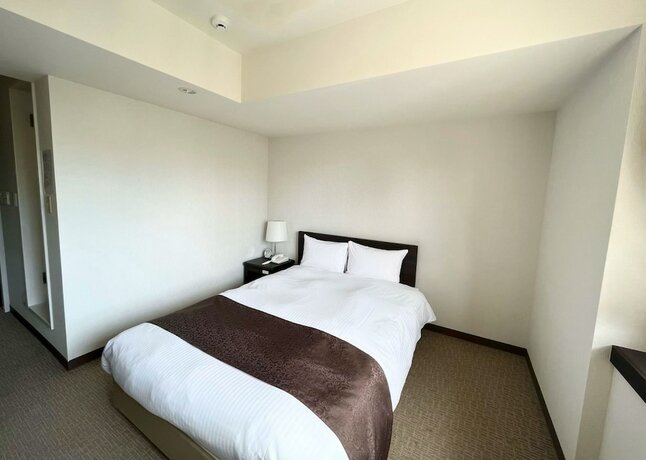 Imagen de la habitación del Hotel Shinjuku Sun Park. Foto 17