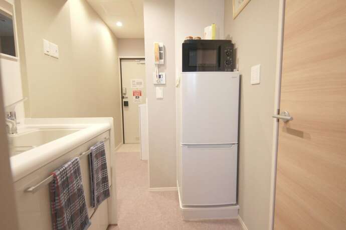 Imagen de la habitación del Hotel Shinjuku Warm House. Foto 12