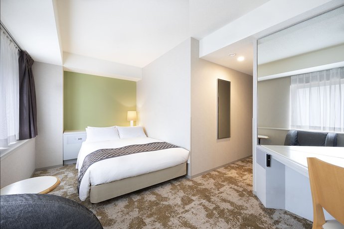 Imagen de la habitación del Hotel Shinjuku Washington Annex. Foto 4