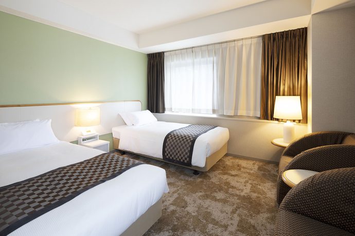 Imagen de la habitación del Hotel Shinjuku Washington Annex. Foto 11