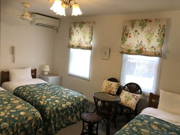 Imagen de la habitación del Hotel Shinkaifujishoen. Foto 17