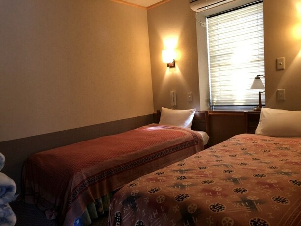 Imagen de la habitación del Hotel Shinkaifujishoen. Foto 18