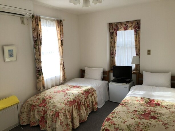 Imagen de la habitación del Hotel Shinkaifujishoen. Foto 24