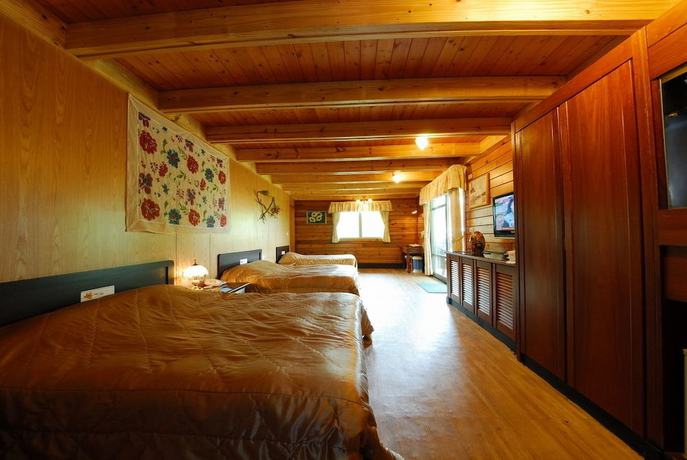 Imagen de la habitación del Hotel Shinmingshan Holiday Inn. Foto 6