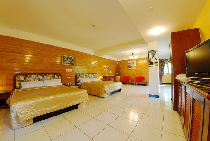 Imagen de la habitación del Hotel Shinmingshan Holiday Inn. Foto 9