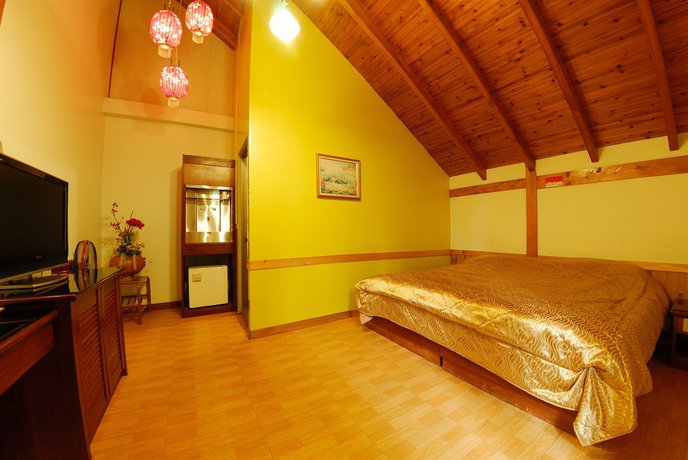 Imagen de la habitación del Hotel Shinmingshan Holiday Inn. Foto 11