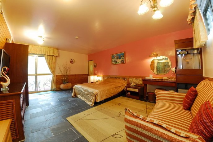 Imagen de la habitación del Hotel Shinmingshan Holiday Inn. Foto 16
