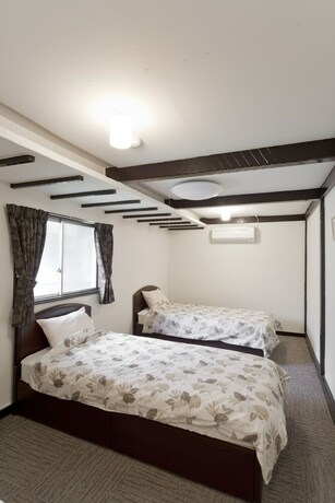 Imagen de la habitación del Hotel Shin-okubo International. Foto 15