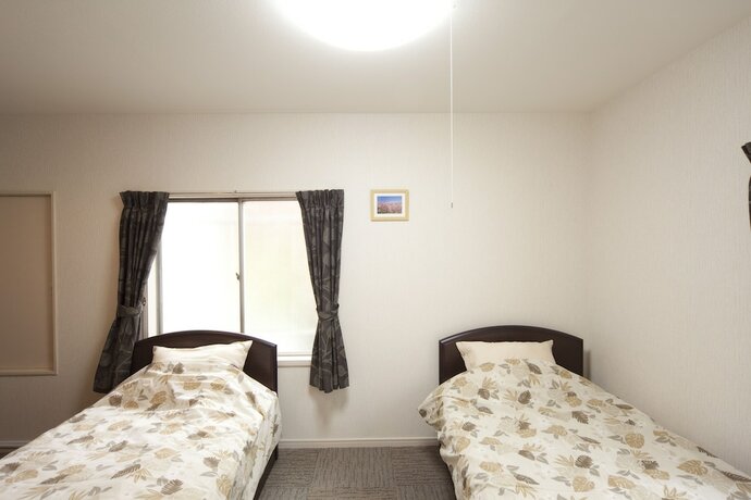 Imagen de la habitación del Hotel Shin-okubo International. Foto 16