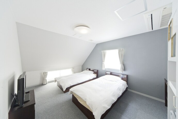 Imagen de la habitación del Hotel Shin-okubo International. Foto 17