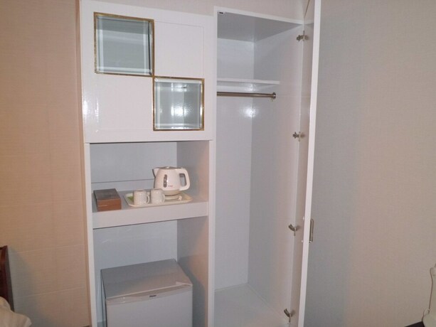 Imagen de la habitación del Hotel Shin-okubo International. Foto 21