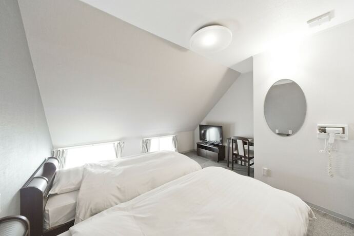 Imagen de la habitación del Hotel Shin-okubo International. Foto 22
