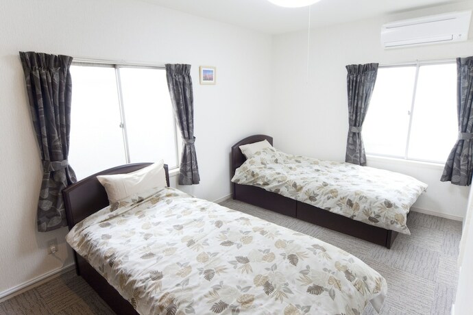 Imagen de la habitación del Hotel Shin-okubo International. Foto 25