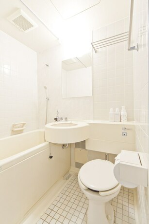 Imagen de la habitación del Hotel Shin-okubo International. Foto 27