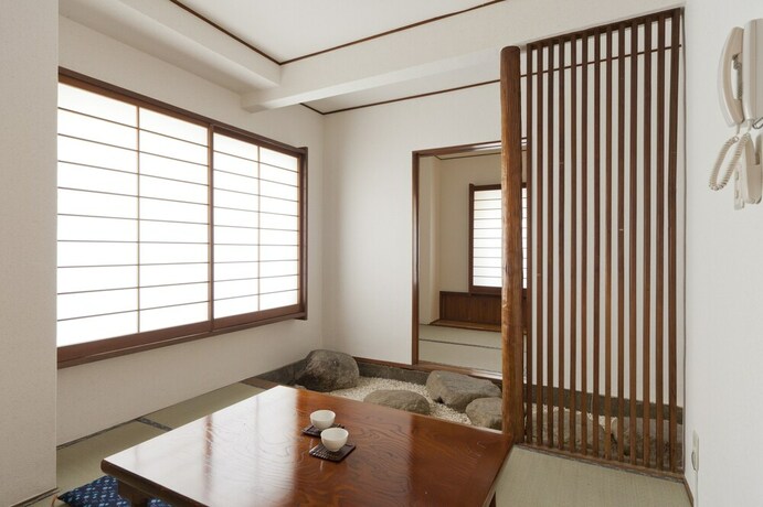Imagen de la habitación del Hotel Shin-okubo Sekitei. Foto 19