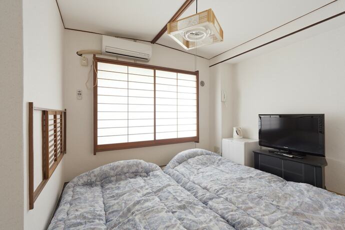 Imagen de la habitación del Hotel Shin-okubo Sekitei. Foto 21