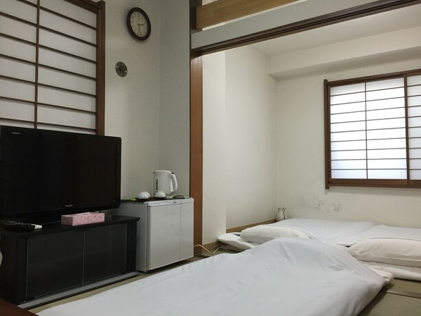 Imagen de la habitación del Hotel Shin-okubo Sekitei. Foto 23