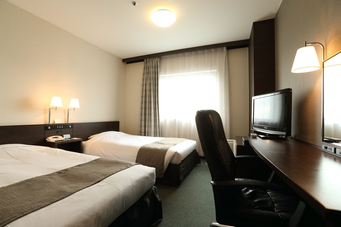 Imagen de la habitación del Hotel Shin-osaka Esaka Tokyu Rei. Foto 7