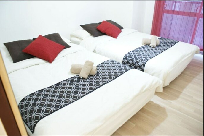 Imagen de la habitación del Hotel Shin-osaka Grand-h 201. Foto 34