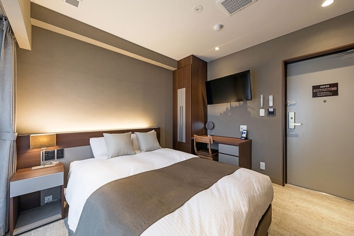 Imagen de la habitación del Hotel Shinpoin Osaka. Foto 14