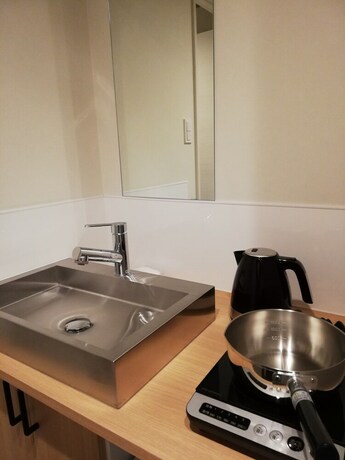 Imagen de la habitación del Hotel Shinsaibashi House. Foto 14