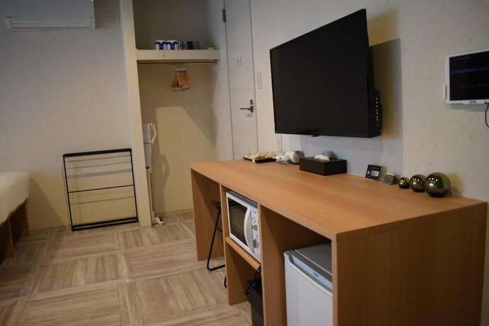 Imagen de la habitación del Hotel Shinsaibashi House. Foto 16
