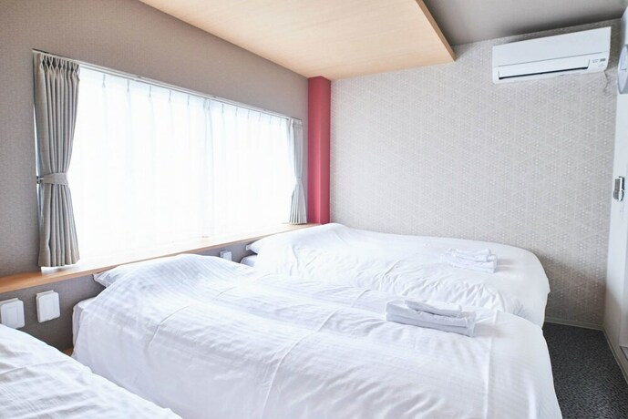 Imagen de la habitación del Hotel Shinsaibashi House. Foto 19