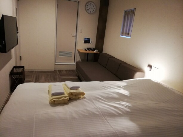 Imagen de la habitación del Hotel Shinsaibashi House. Foto 20