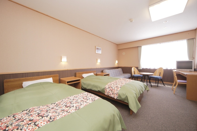 Imagen de la habitación del Hotel Shintamagawa Onsen. Foto 8