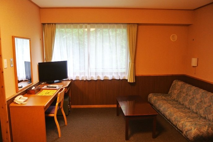 Imagen de la habitación del Hotel Shintamagawa Onsen. Foto 11