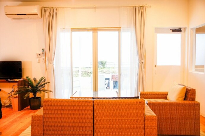 Imagen de la habitación del Hotel Shirahama Beach Garden. Foto 20